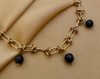 chunky gold link necklace with black pearl pendants