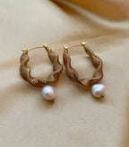 Gold hoop earrings with freshwater pearl drops 
