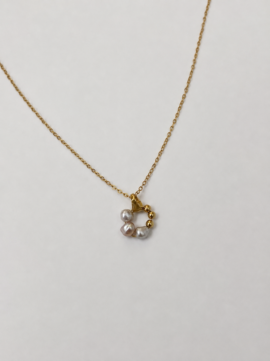 Collier pendentif perle d'eau douce – Perle grise auréolée