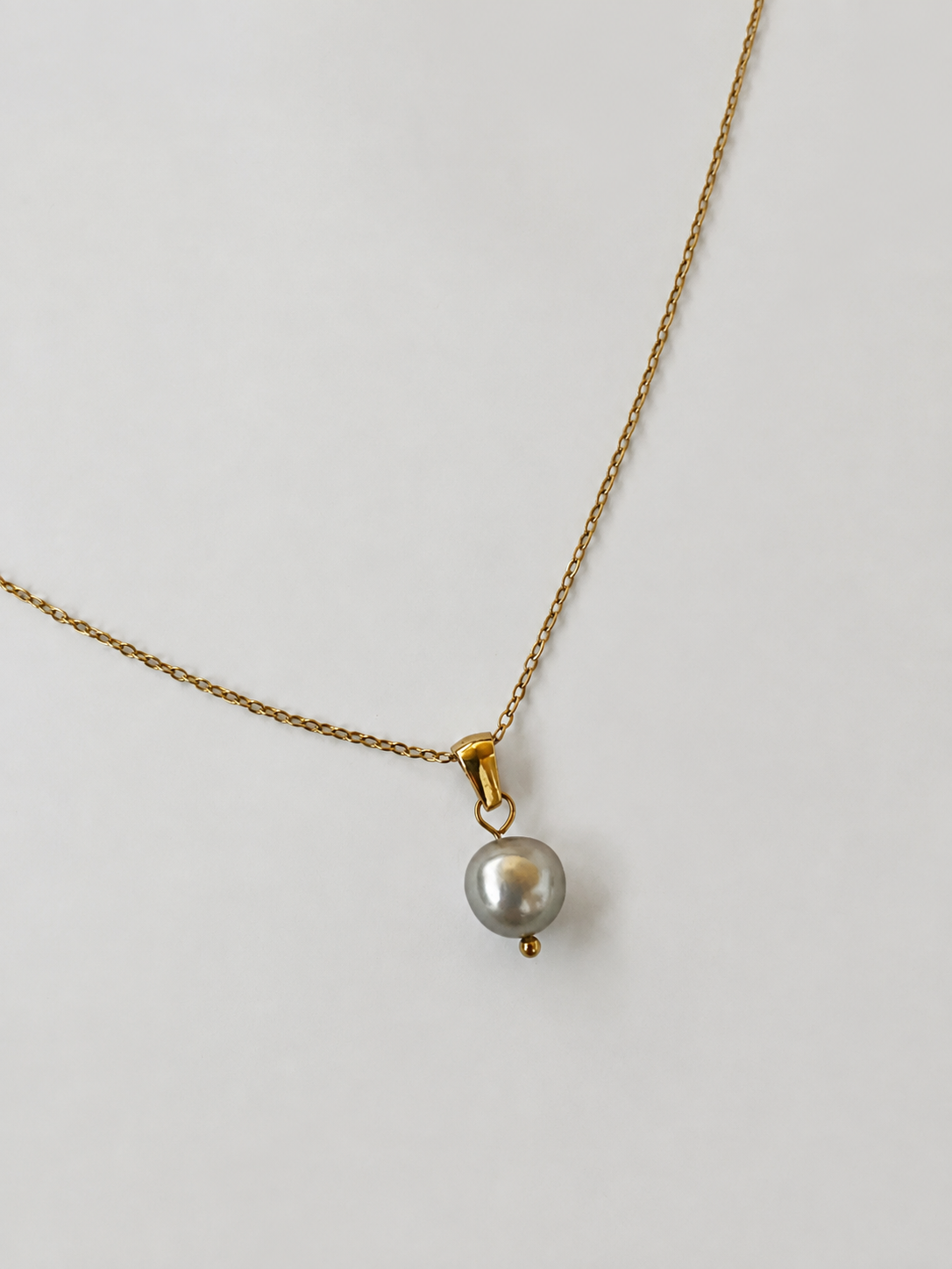 Pendentif baroque en perle de culture d'eau douce blanche