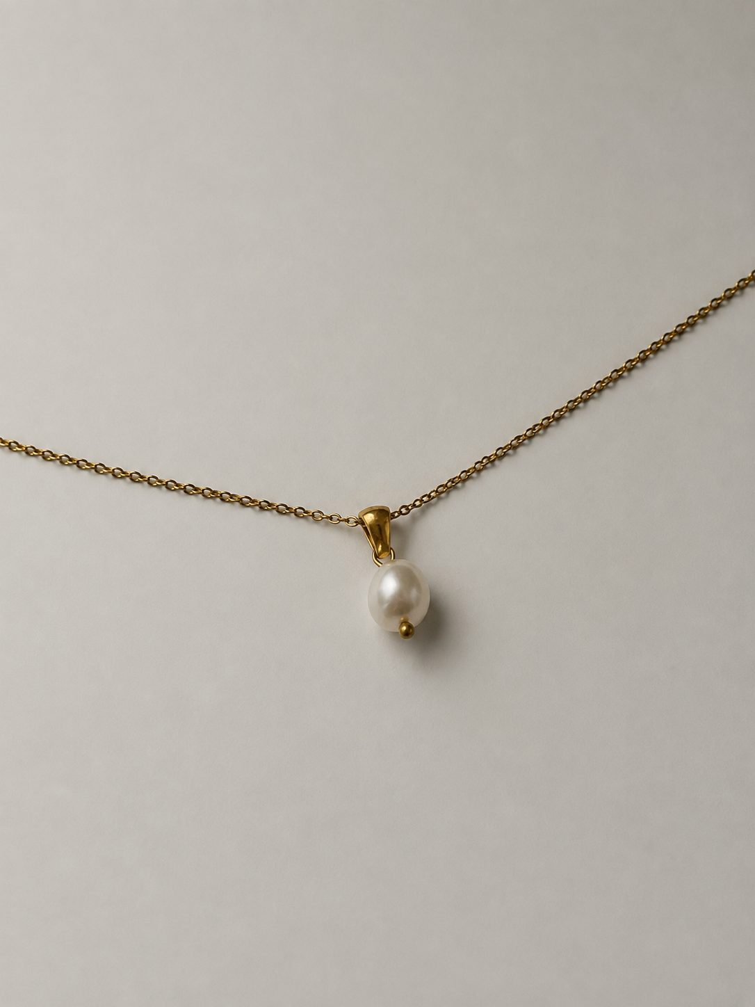 Pendentif baroque en perle de culture d'eau douce blanche