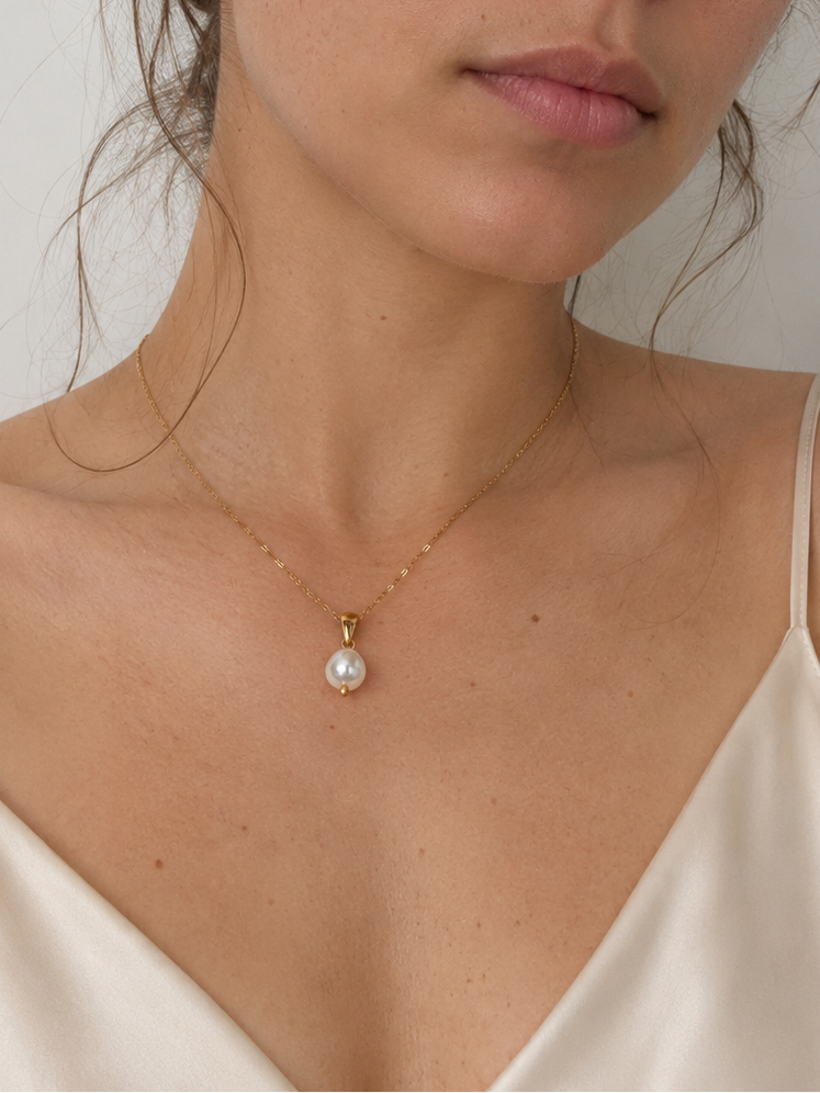 Pendentif baroque en perle de culture d'eau douce blanche