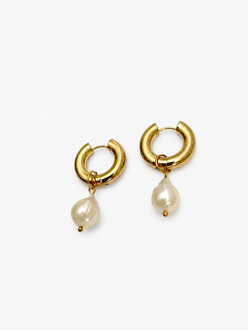 Pair of chunky gold hoop earrings with 13 mm white baroque freshwater pearl drops.