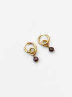 Pair of sculptural gold double-hoop earrings with 4 mm dark grey baroque freshwater pearl drops