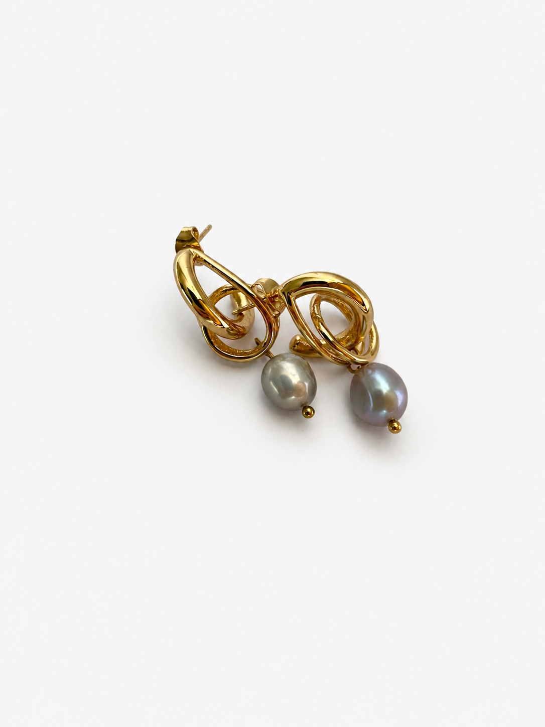 Angled pair of gold droplet earrings with 10 mm grey baroque freshwater pearl drops