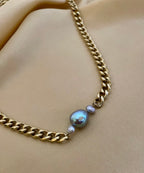 grey baroque pearl necklace with a gold chain