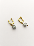 Pair of gold drop earrings with 10 mm grey baroque freshwater pearl pendants.