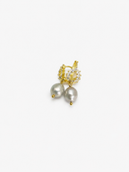 Angled pair of gold halo earrings with organic grey baroque freshwater pearl drops and clear stone settings