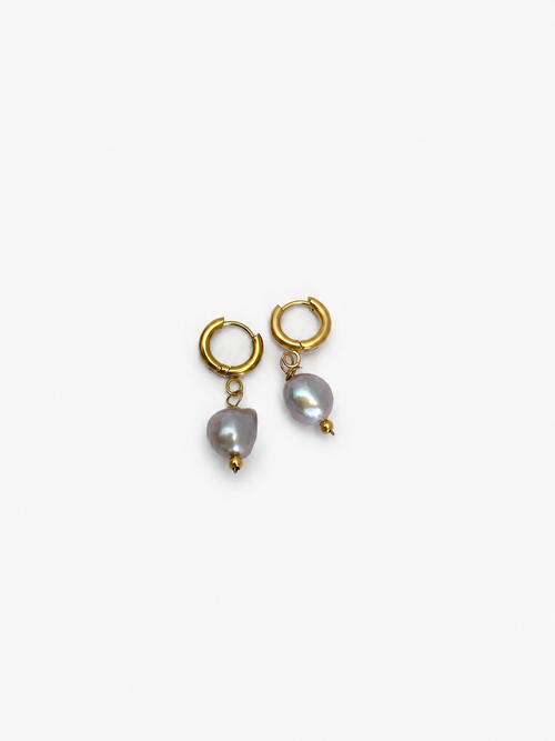 Front view of gold hoop earrings with organic grey freshwater baroque pearl drops.