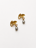 Pair of gold ginkgo leaf drop earrings with 6 mm oval grey freshwater pearls