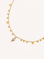 Gold bead charms necklace with polished disc accents and a 6 mm oval light grey freshwater pearl pendant