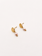 Pair of gold stud earrings with 5 mm natural pink oval freshwater pearl drops.