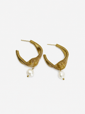 Pair of sculptural coiled gold demi-hoop earrings with 10 mm white baroque freshwater pearl drops