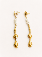 Pair of sculptural gold Molten River drop earrings with 4 mm white baroque freshwater pearls