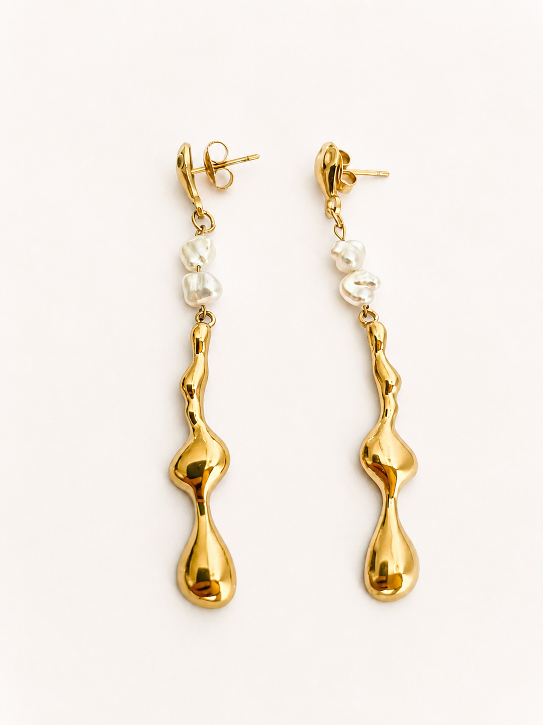 Pair of sculptural gold Molten River drop earrings with 4 mm white baroque freshwater pearls