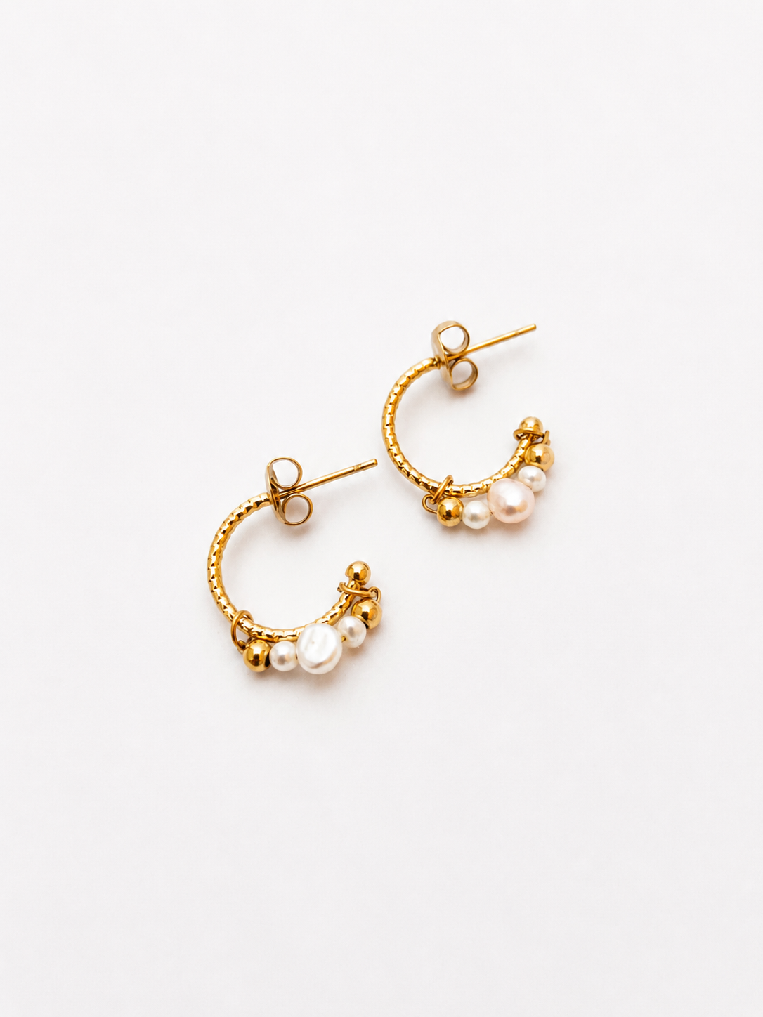 Pair of small gold creole hoop earrings with 4 mm and 2 mm white baroque freshwater pearls